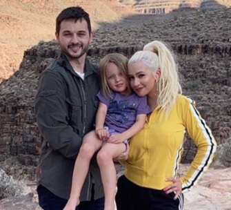 Christina Aguilera with her partner and their daughter.
